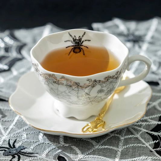 Spider Web Teacup And Saucer With Gold Flourishes